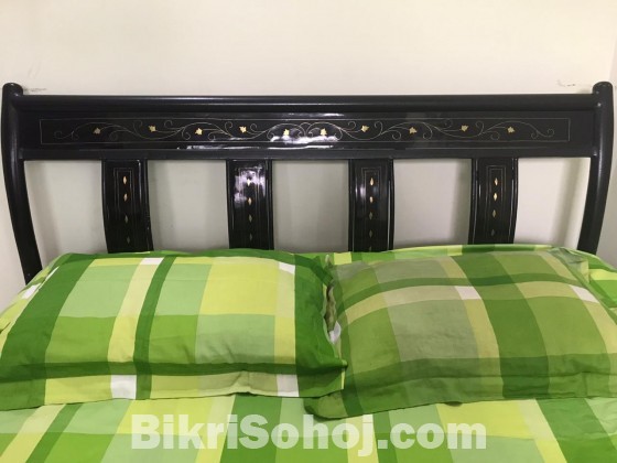 Rod iron with wooden design double bed